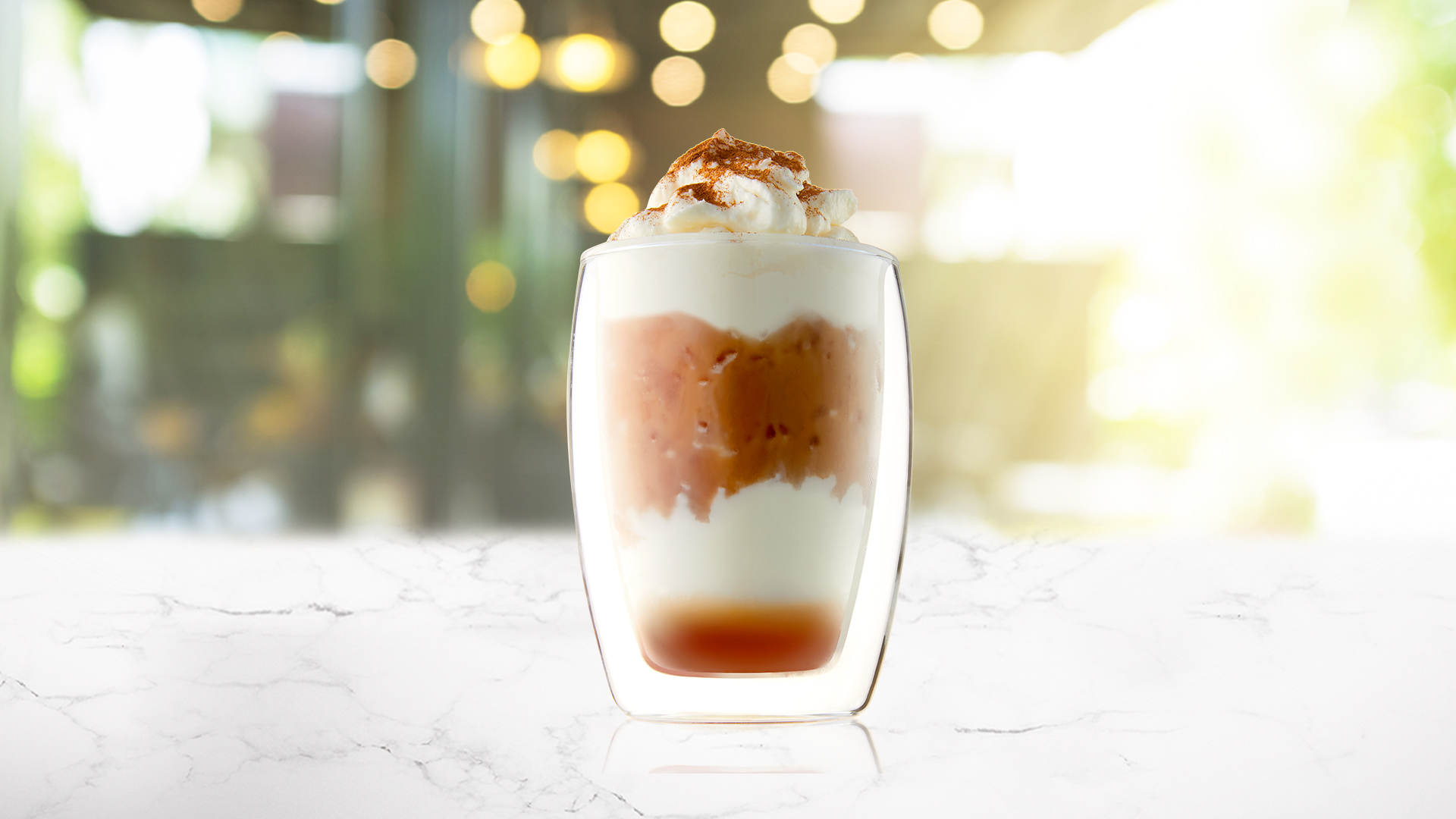 A Far East Iced Latte on a marble surface