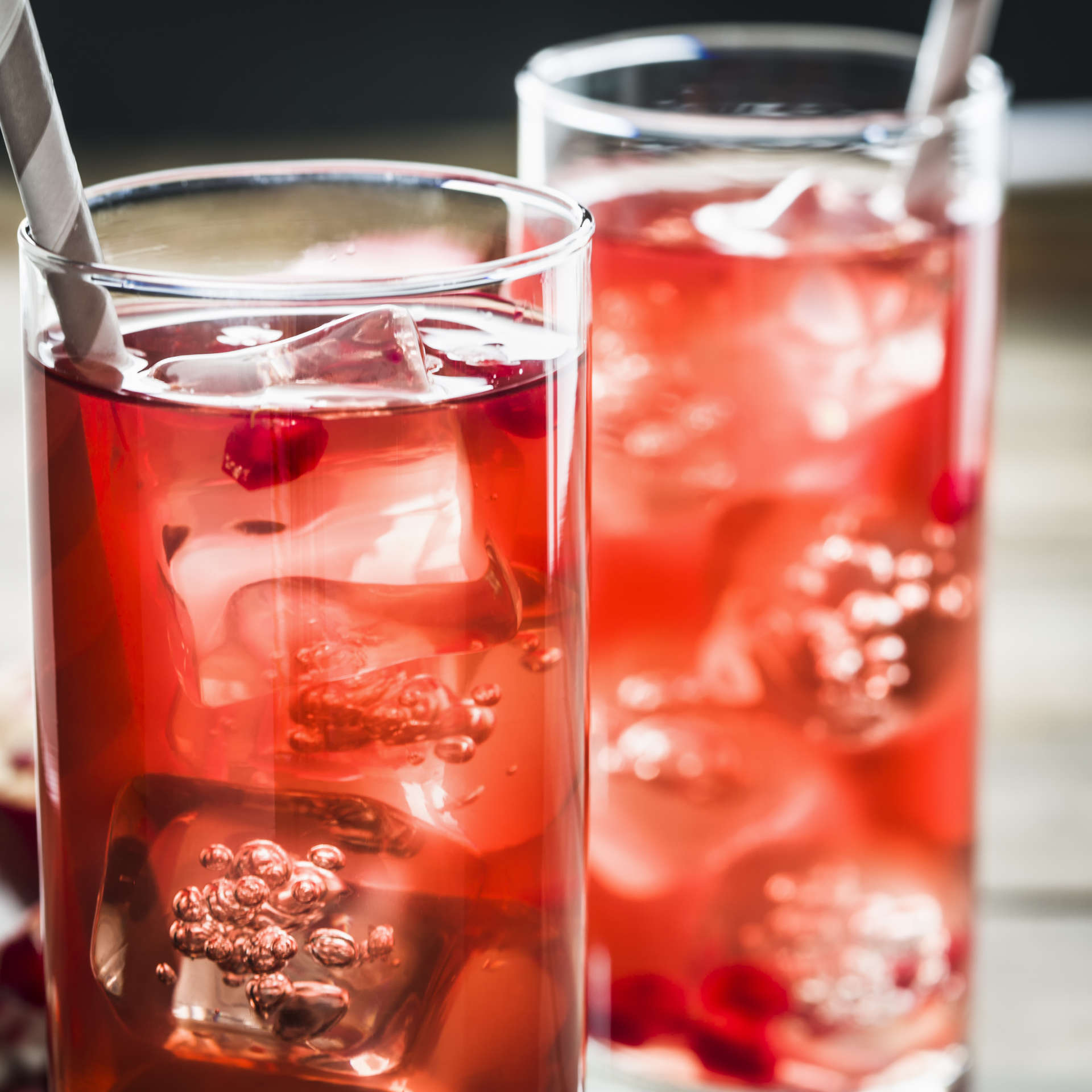 two glasses of Grenadine Booster side by side