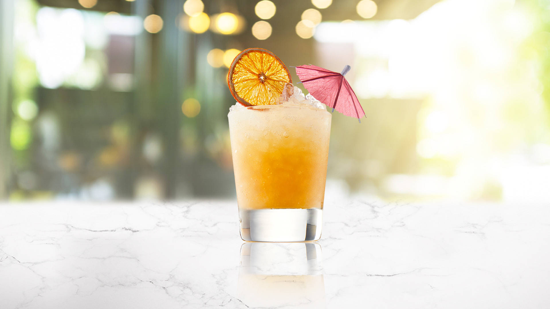A glass of sunny day cocktail on a transparent background